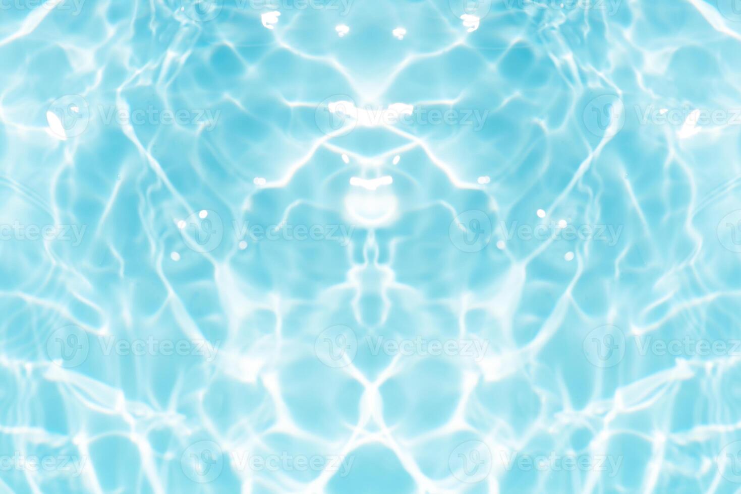 Bluewater waves on the surface ripples blurred. Defocus blurred transparent blue colored clear calm water surface texture with splash and bubbles. Water waves with shining pattern texture background. photo