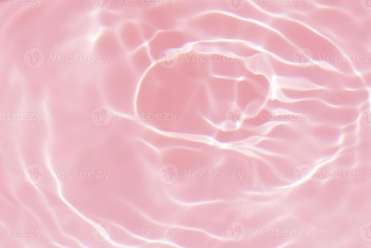 Blue water with ripples on the surface. Defocus blurred transparent blue colored clear calm water surface texture with splashes and bubbles. Water waves with shining pattern texture background. photo