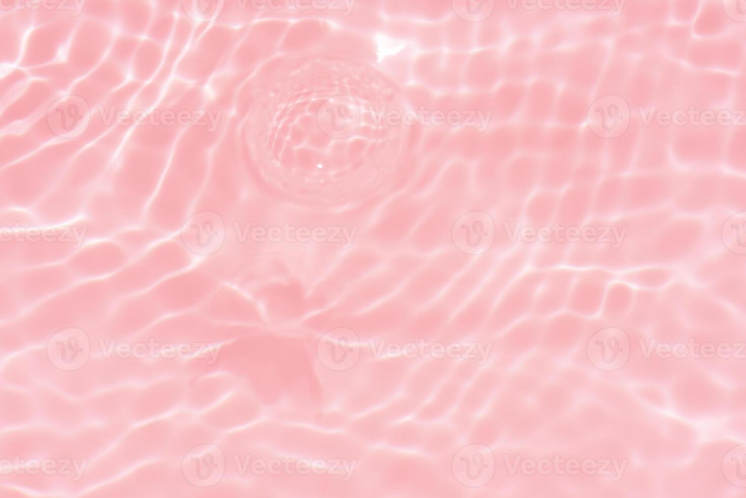 Blue water with ripples on the surface. Defocus blurred transparent blue colored clear calm water surface texture with splashes and bubbles. Water waves with shining pattern texture background. photo