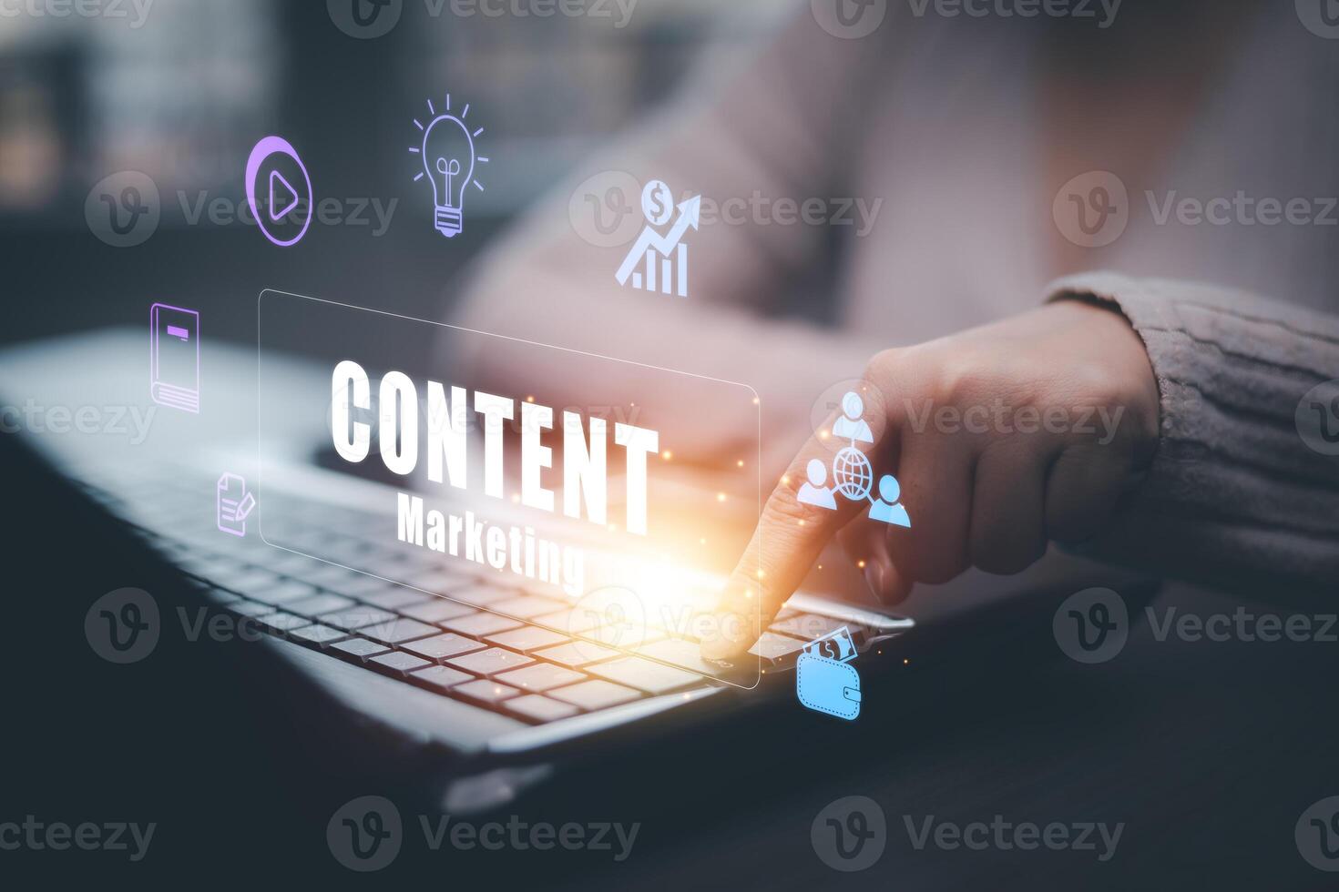 A businesswoman is using a laptop to create marketing content.Creating marketing strategies involves sharing information to attract customer interest.Online marketing and digital marketing. photo