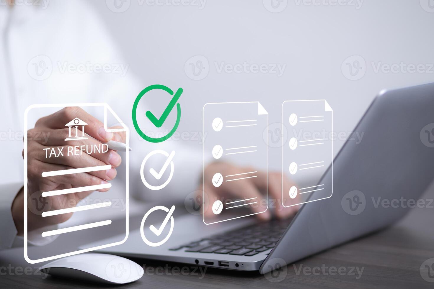 Man using a laptop with TAX REFUND and refund tax of duty taxation business, graphs and chart being demonstrated on the screen media, tablet pc and selecting tax refund, Saving tax for business photo