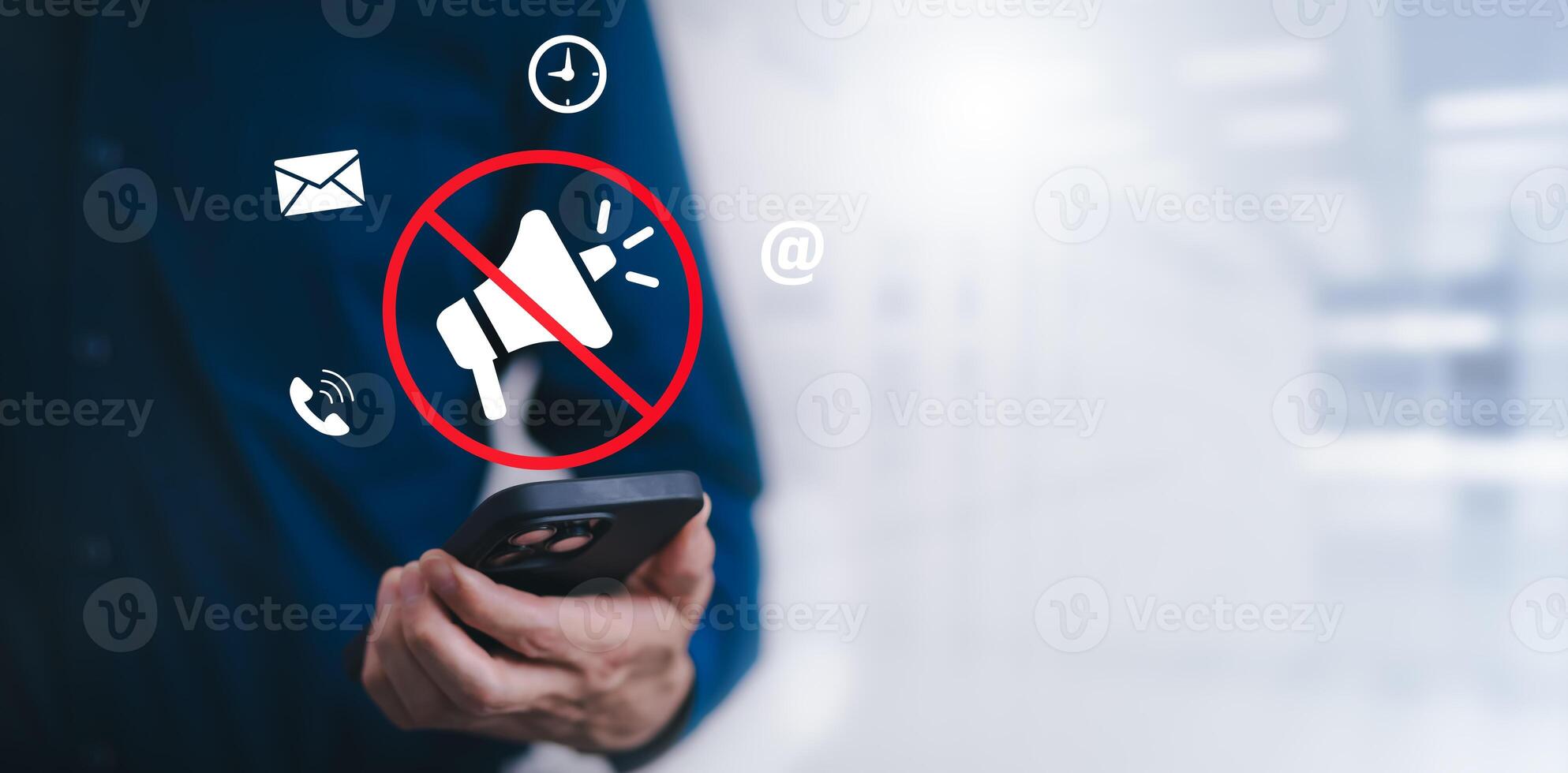 Businessman using smartphone touch mute icon on virtual screen. Blog blog speak talk advertising presentation,Voice recognition, speech detection and deep learning application,Voice Assistance photo