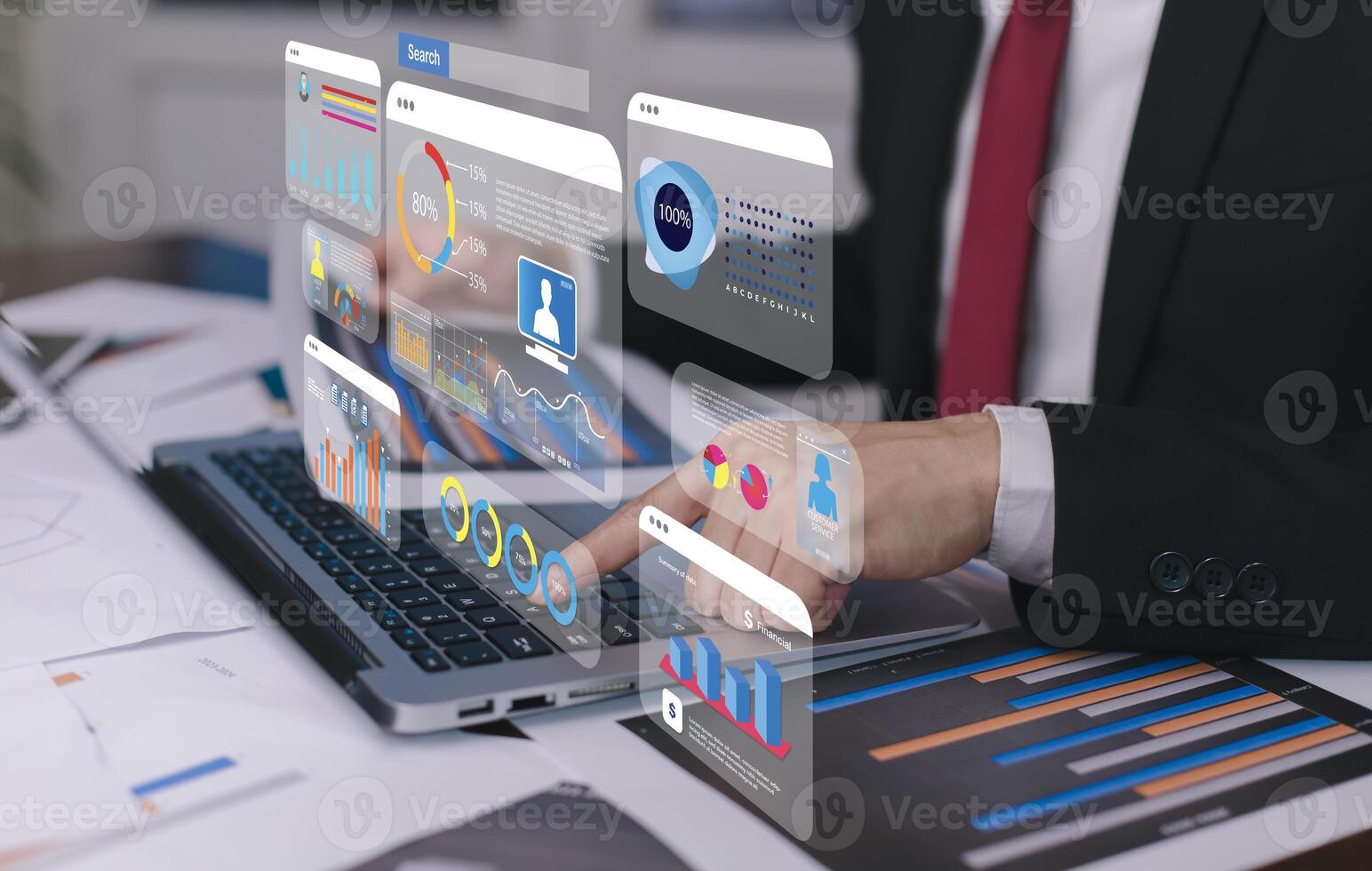 Businessman using a laptop with Analytics and Data Management Systems Analyst working in Business Analytics and Data Management Systems to make reports and corporate strategy for finance, operations photo