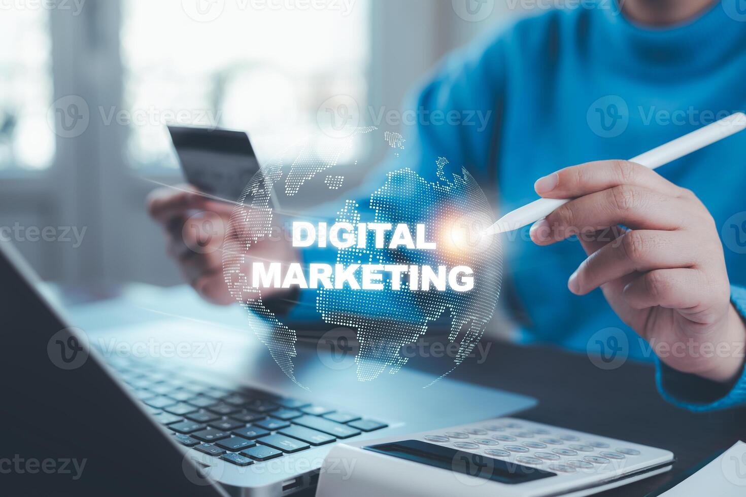 A businessman is using a laptop to create digital marketing content.Creating marketing strategies involves sharing information to attract customer interest.Online marketing and digital marketing. photo
