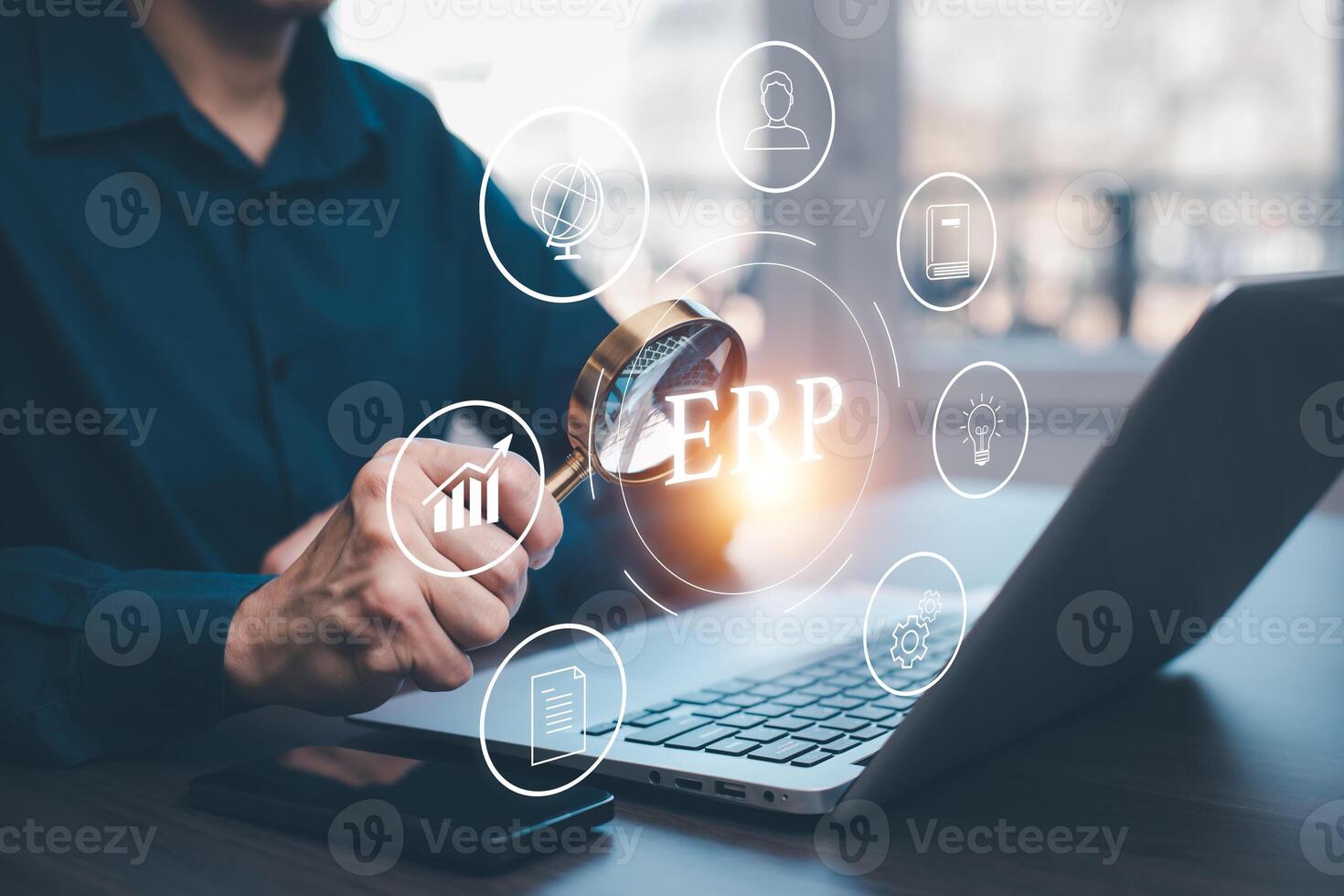 Business people using a laptop with document management for ERP. Enterprise resource planning concept,Enterprise Resource Management ERP software system for business resources plan presented. photo