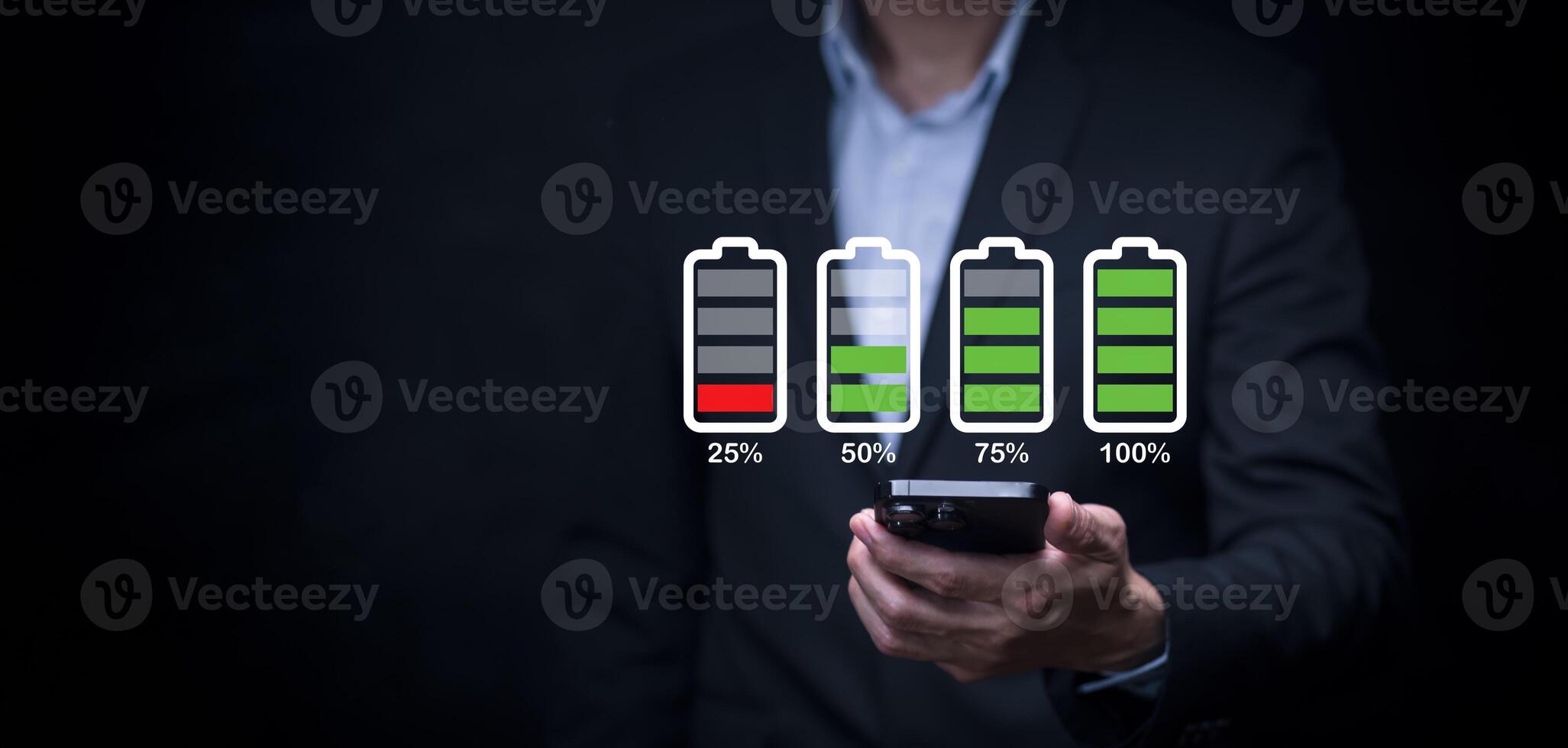 business man holding mobile smart phones charging , Battery icon set.Battery supply concept. plugging a charger in a smart phone with energy bank power charger Modern lifestyle energy technology. photo