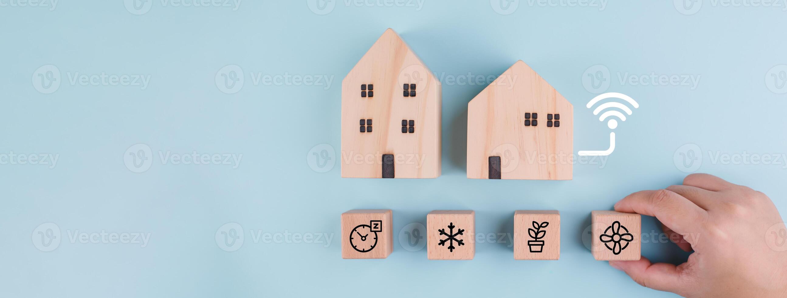 smart home concept , wifi icon Internet of things , iot , smart home and network connect concept. Human hand holding white phone and smart home application. photo