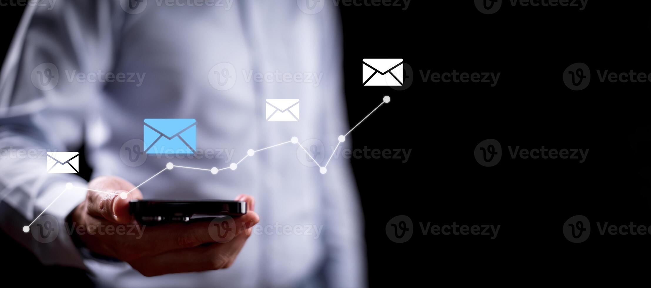 Businesswoman holding smartphone with communication icons, letter icon, email icons, and newsletter email and protect your personal information or spam mail, Customer service call center contact. photo