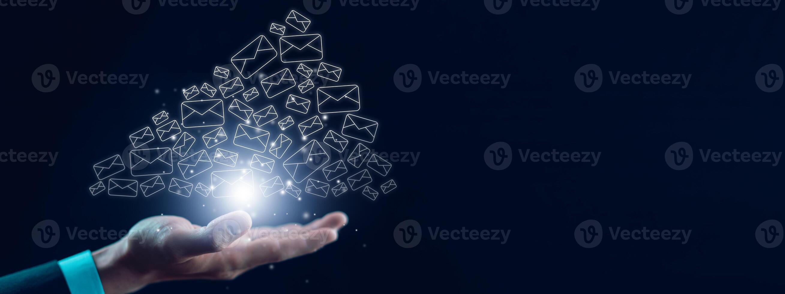 Businessman sending email by laptop computer to customer, business contact and communication, email icon, email marketing concept, send e-mail or newsletter, online working internet network. photo