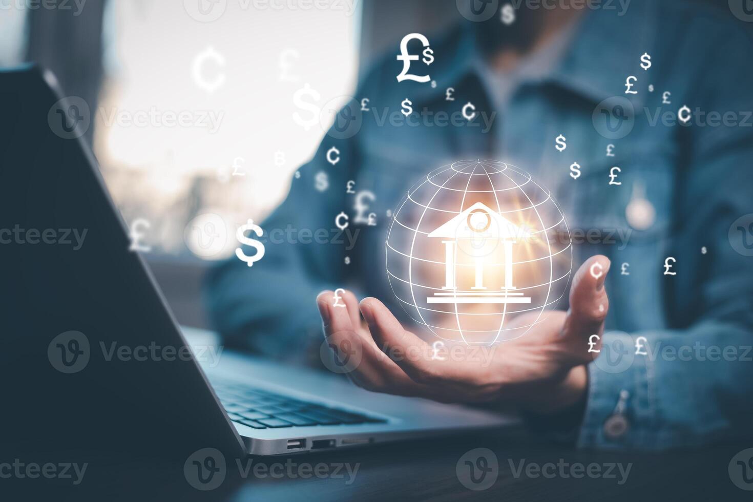 Businessman holding virtual bank with currency sign for forex exchange and global money transfer by technology concept. photo