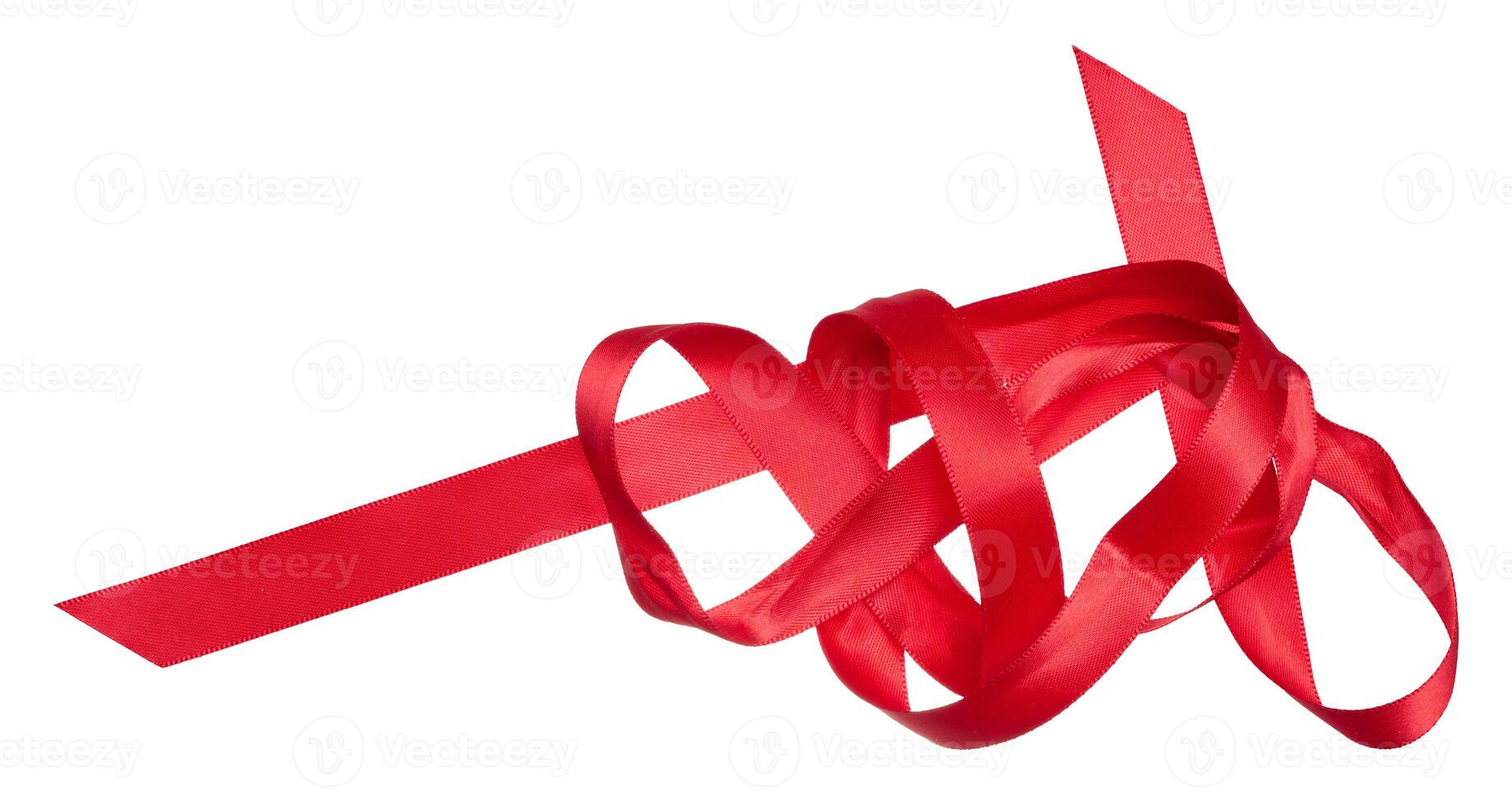 Piece of red satin ribbon on isolated background photo