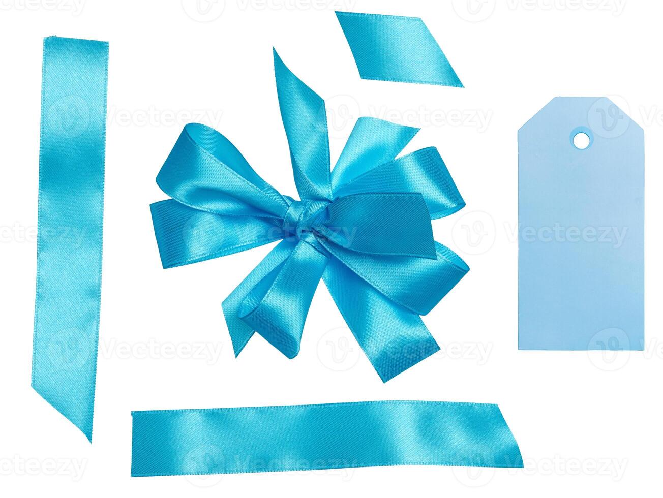 Blue silk ribbon and bow, paper tag for congratulations. Isolated background photo