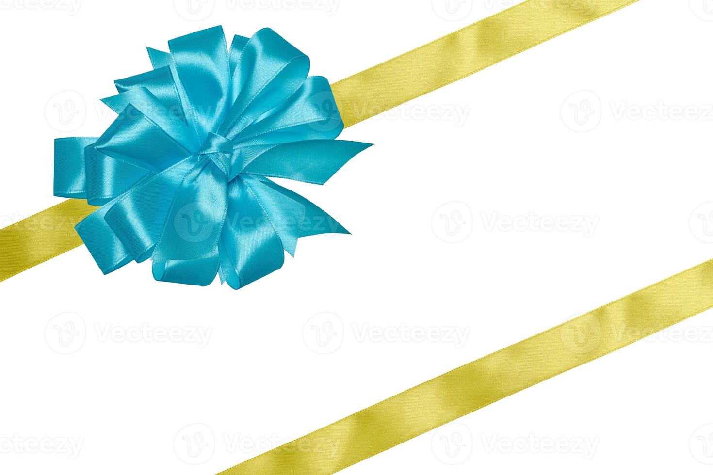 Yellow silk ribbon and a tied big blue bow on an isolated background, top view. Gift packaging photo