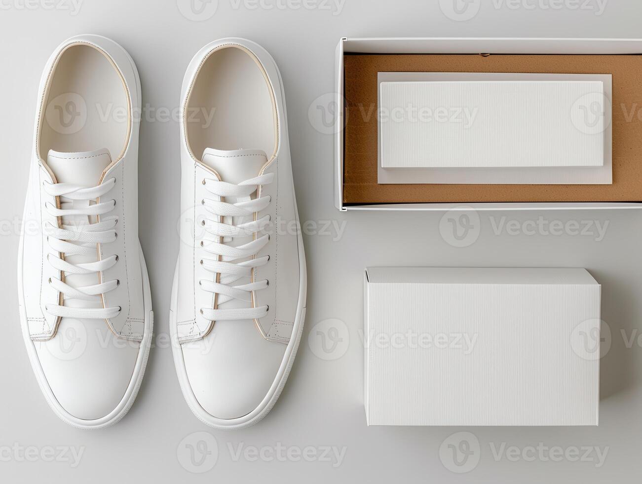 Top view of new white sneakers with minimalist style packaging on a light background. photo