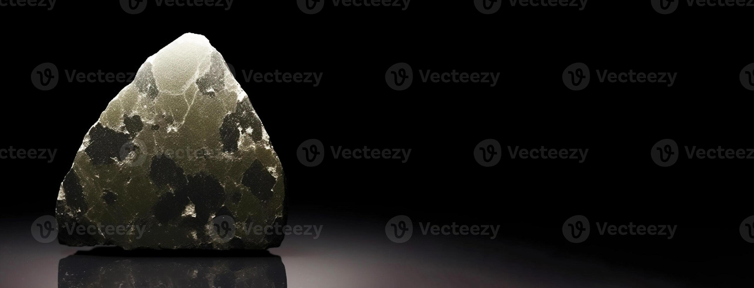 Zincochromite fossil mineral stone. Geological crystalline fossil. Dark background close-up. photo