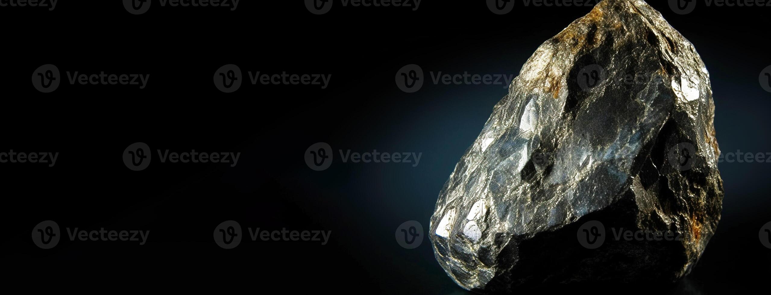 Rickardite is a rare precious natural stone on a black background. . Header banner mockup with space. photo