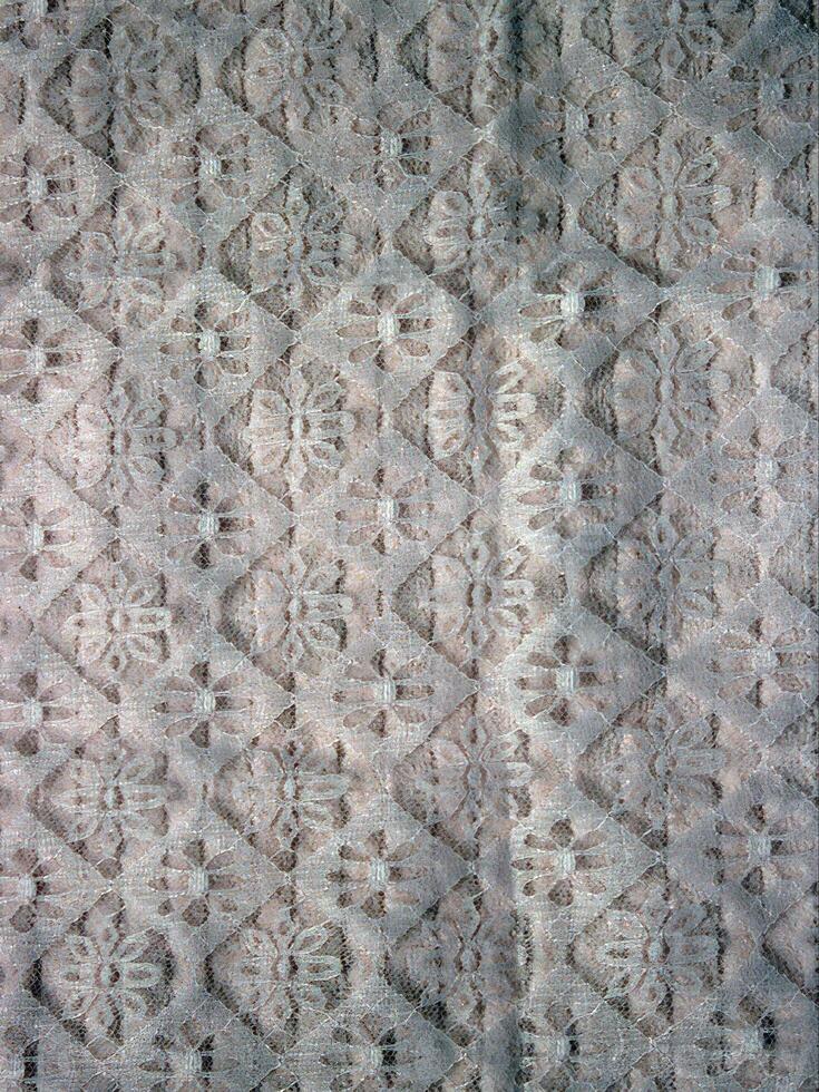 Abstract fabrics background. Textile decoration close view photo