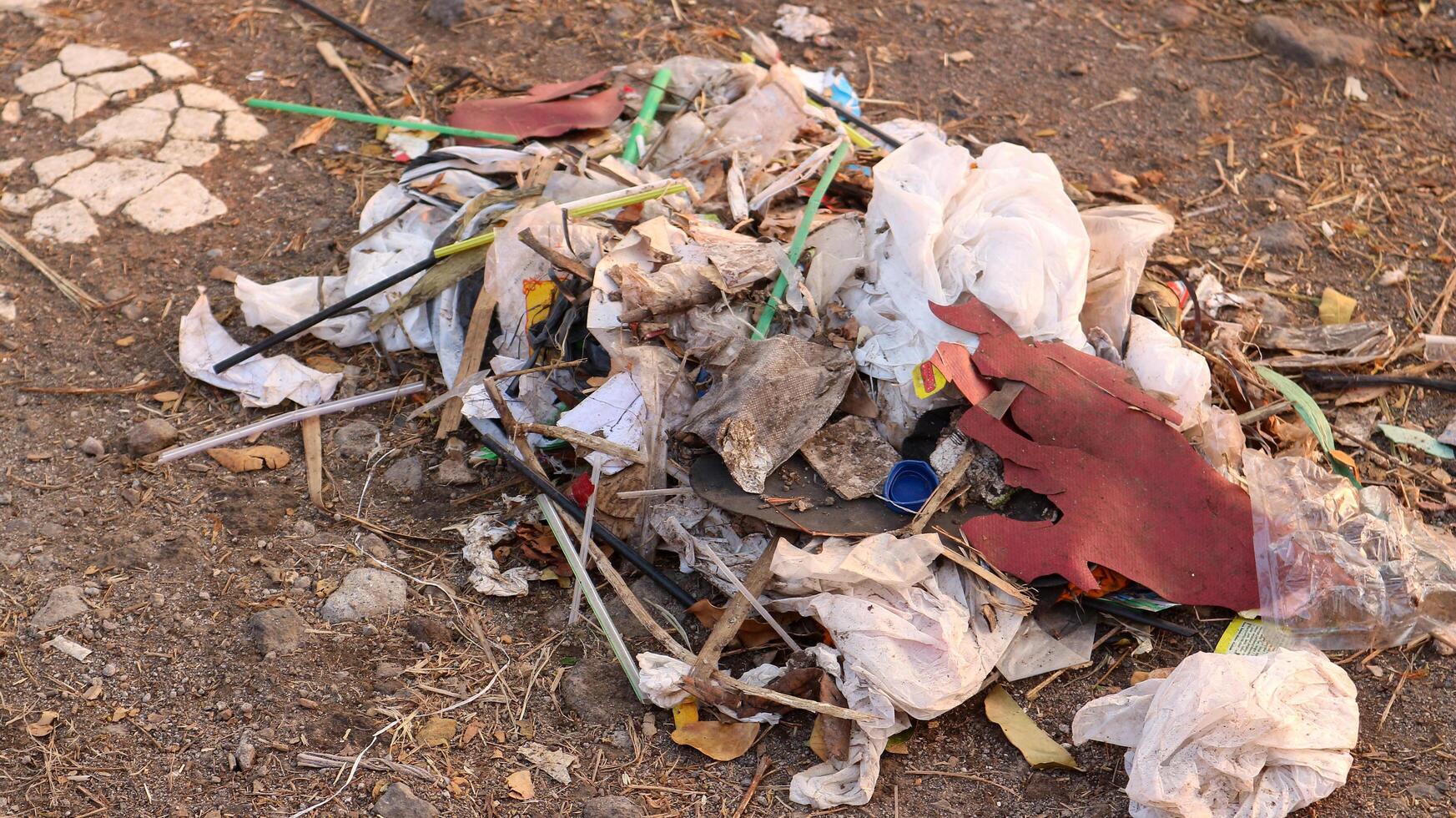 pile of plastic garbage waste on the floor photo
