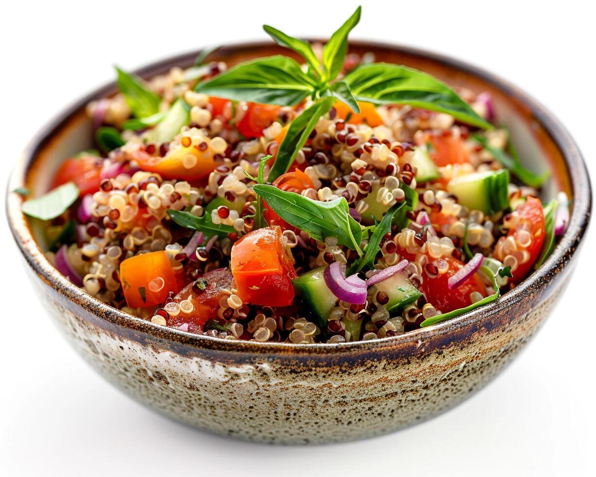 a bowl of quinoa salad with vegetables and herbs photo