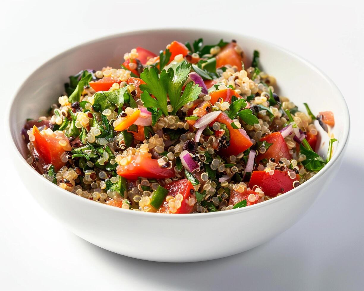 a bowl of quinoa salad with tomatoes, onions and herbs photo