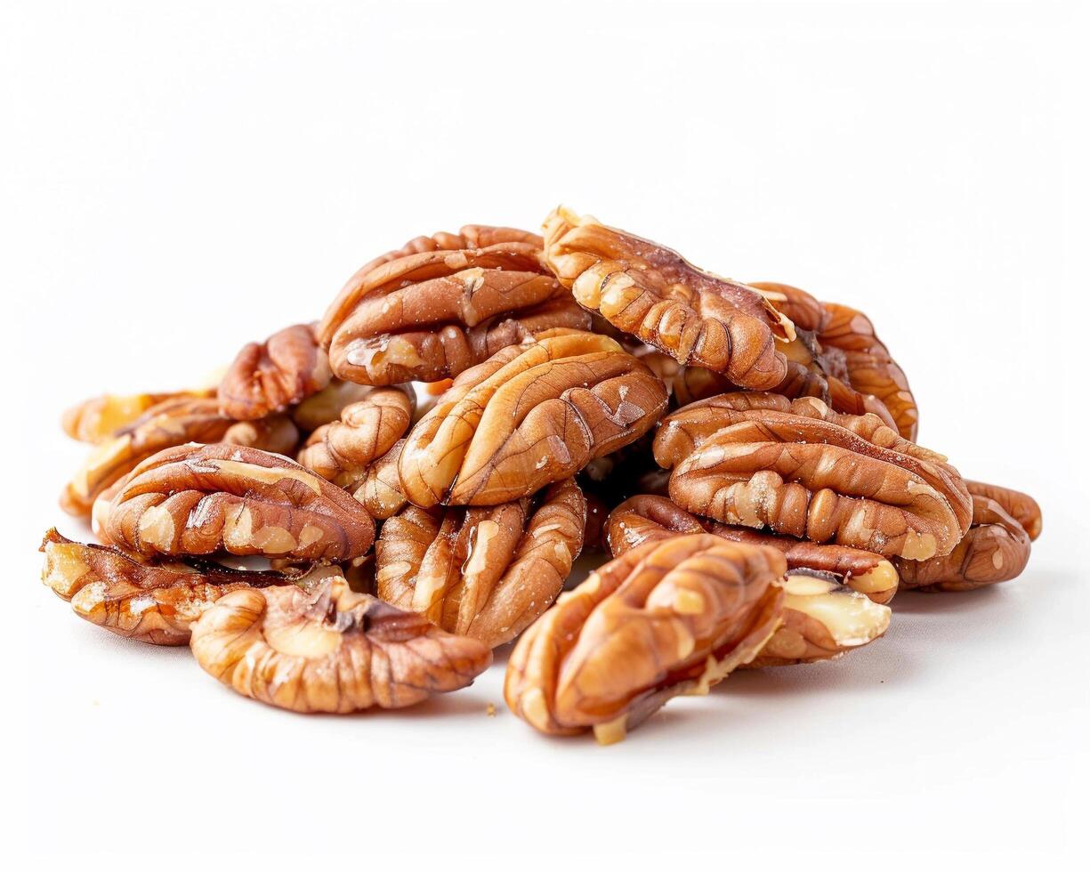 a pile of pecans on a white background photo