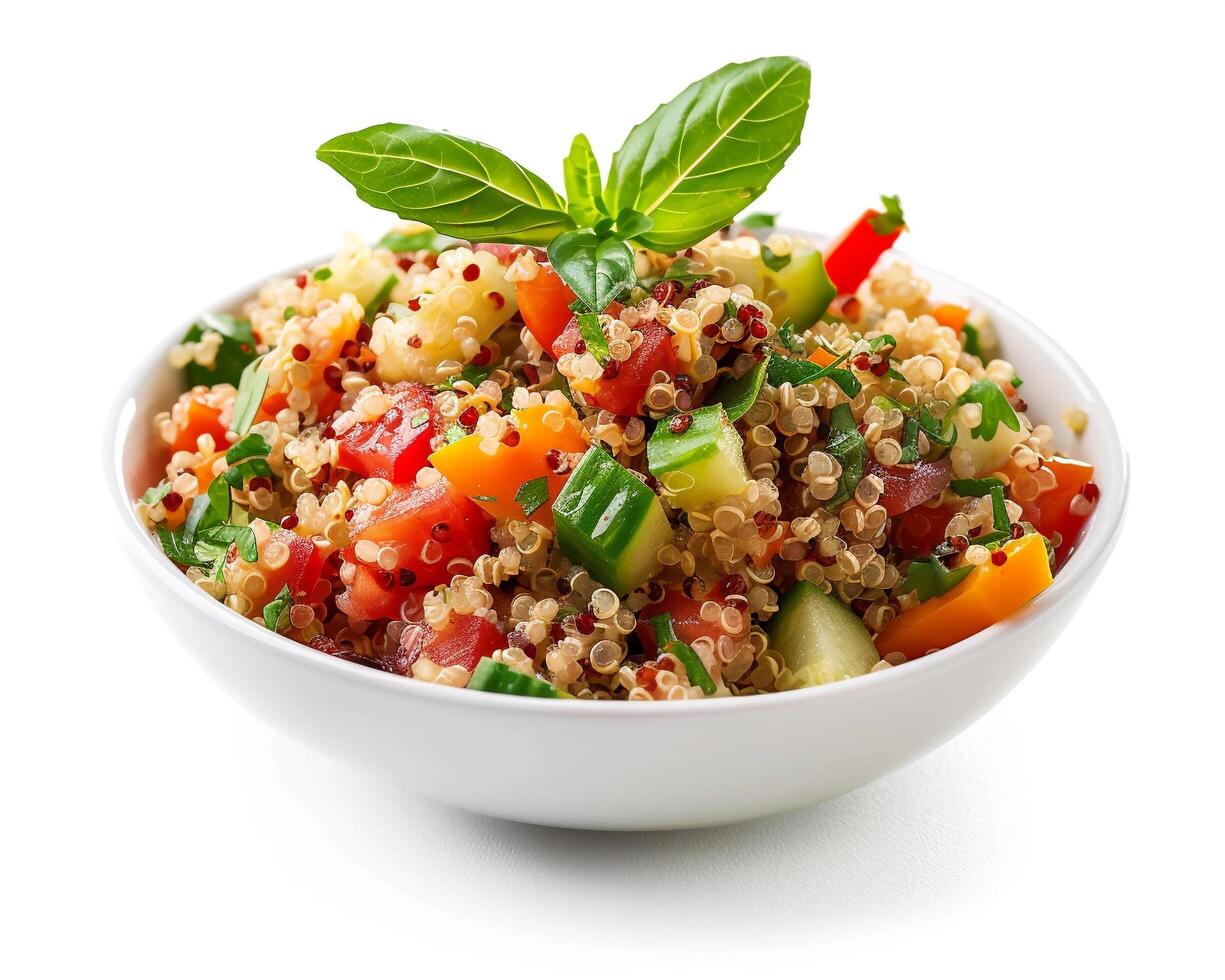 a bowl of quinoa salad with vegetables and herbs photo