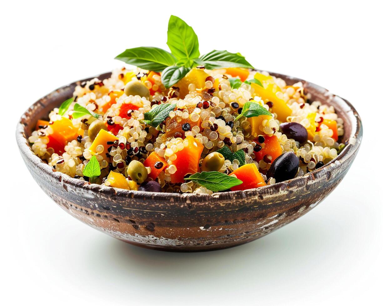 a bowl of quinoa salad with vegetables and herbs photo