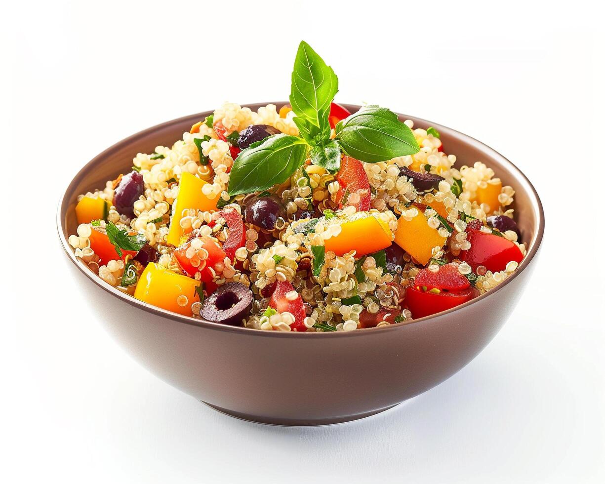 a bowl of couscous salad with tomatoes, olives and basil photo