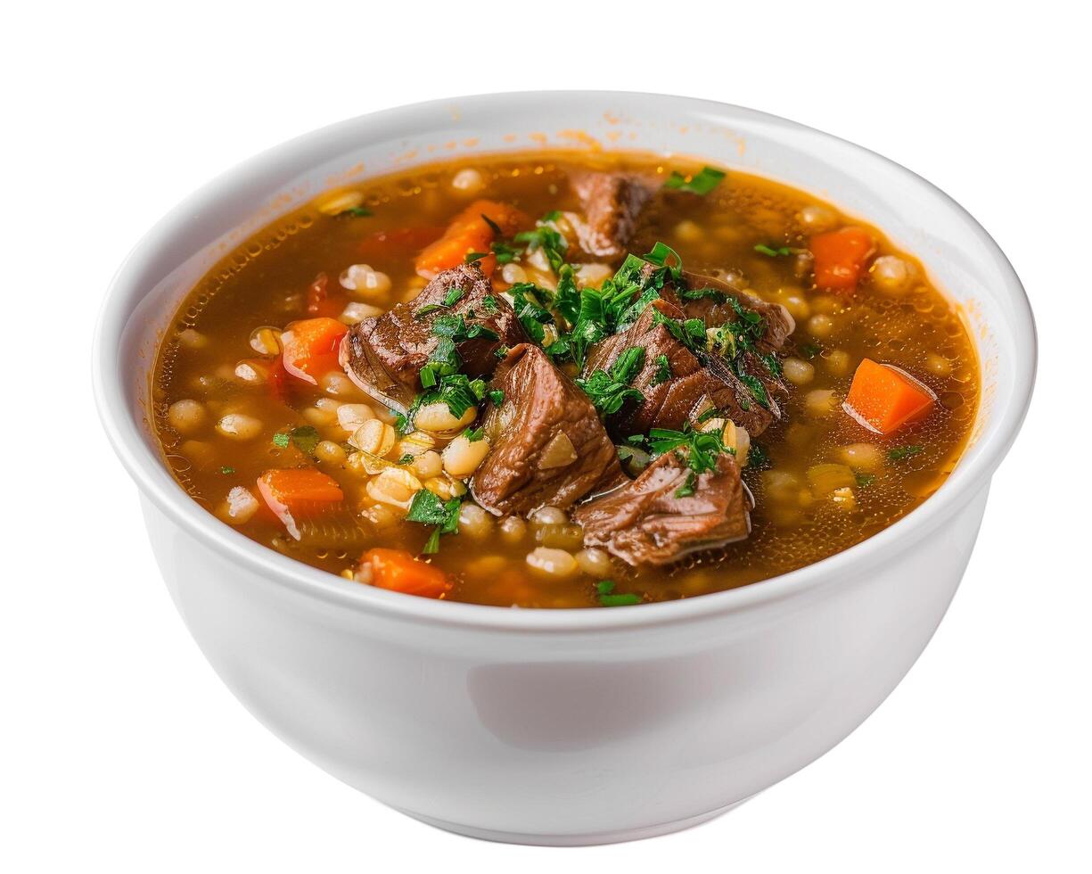 a bowl of beef and barley soup with carrots and parsley photo