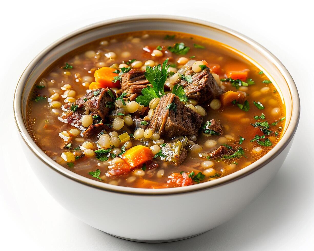 a bowl of soup with meat and vegetables photo