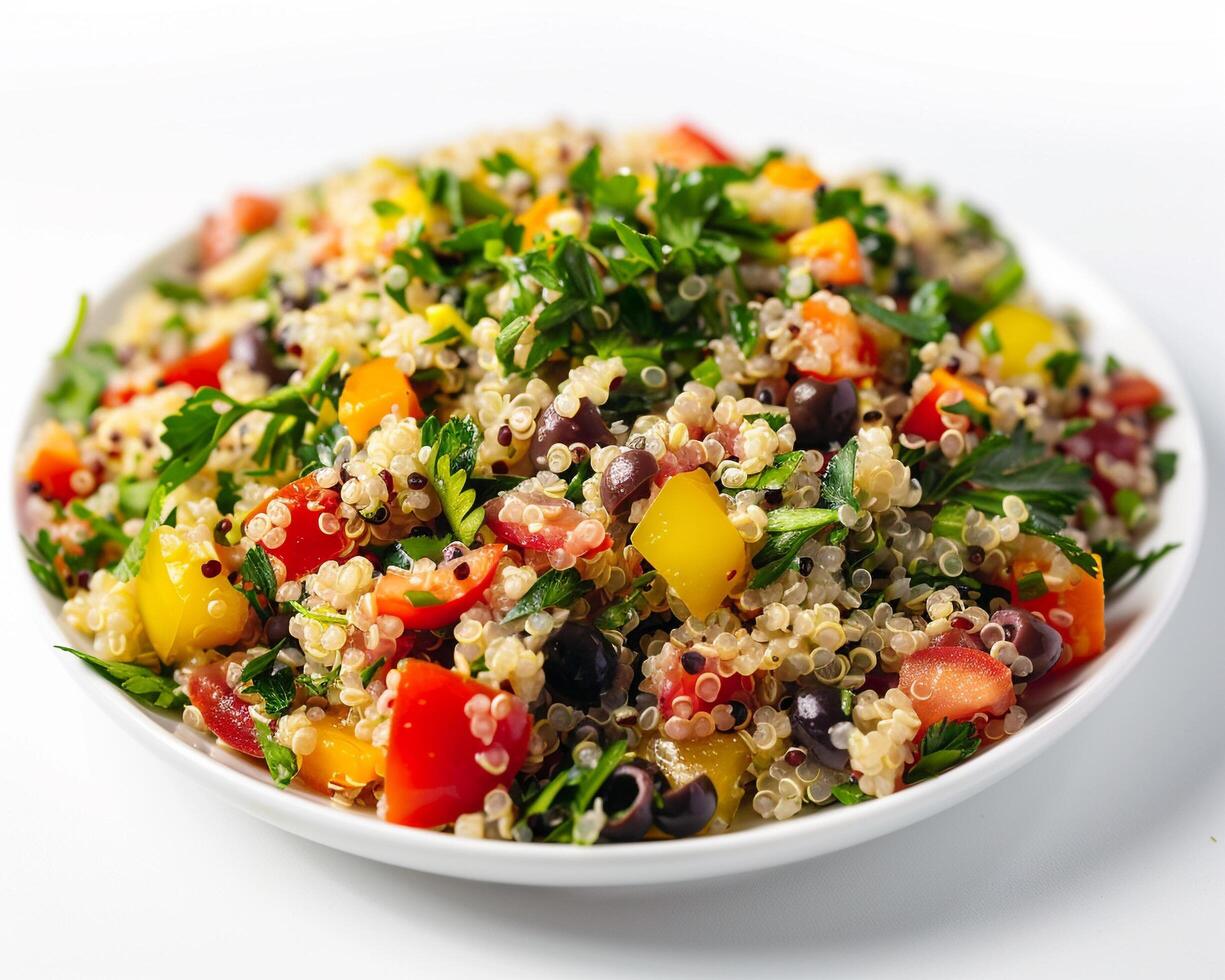 a bowl of quinoa salad with vegetables and herbs photo