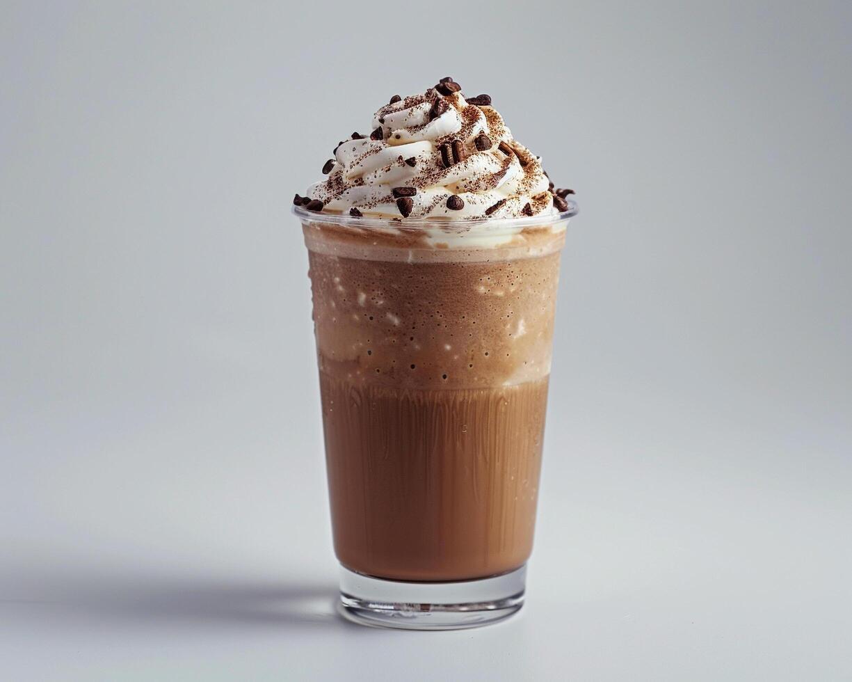 a chocolate milkshake with whipped cream and chocolate chips photo