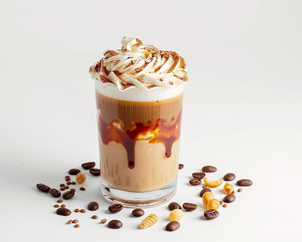 a coffee drink with whipped cream and caramel photo