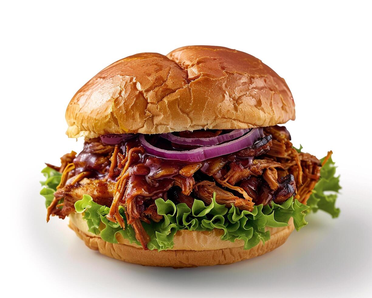 a pulled pork sandwich with onions and lettuce photo