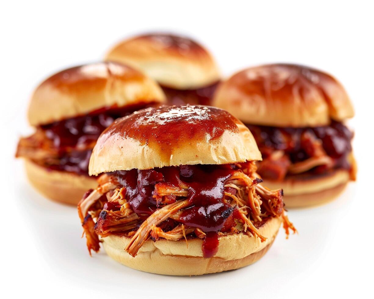 three pulled pork sliders on a white background photo