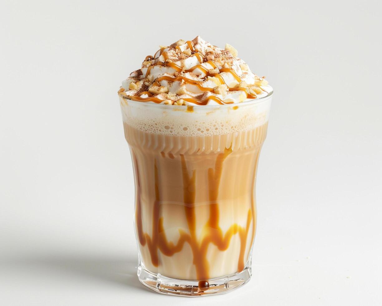 a coffee drink with caramel and whipped cream photo