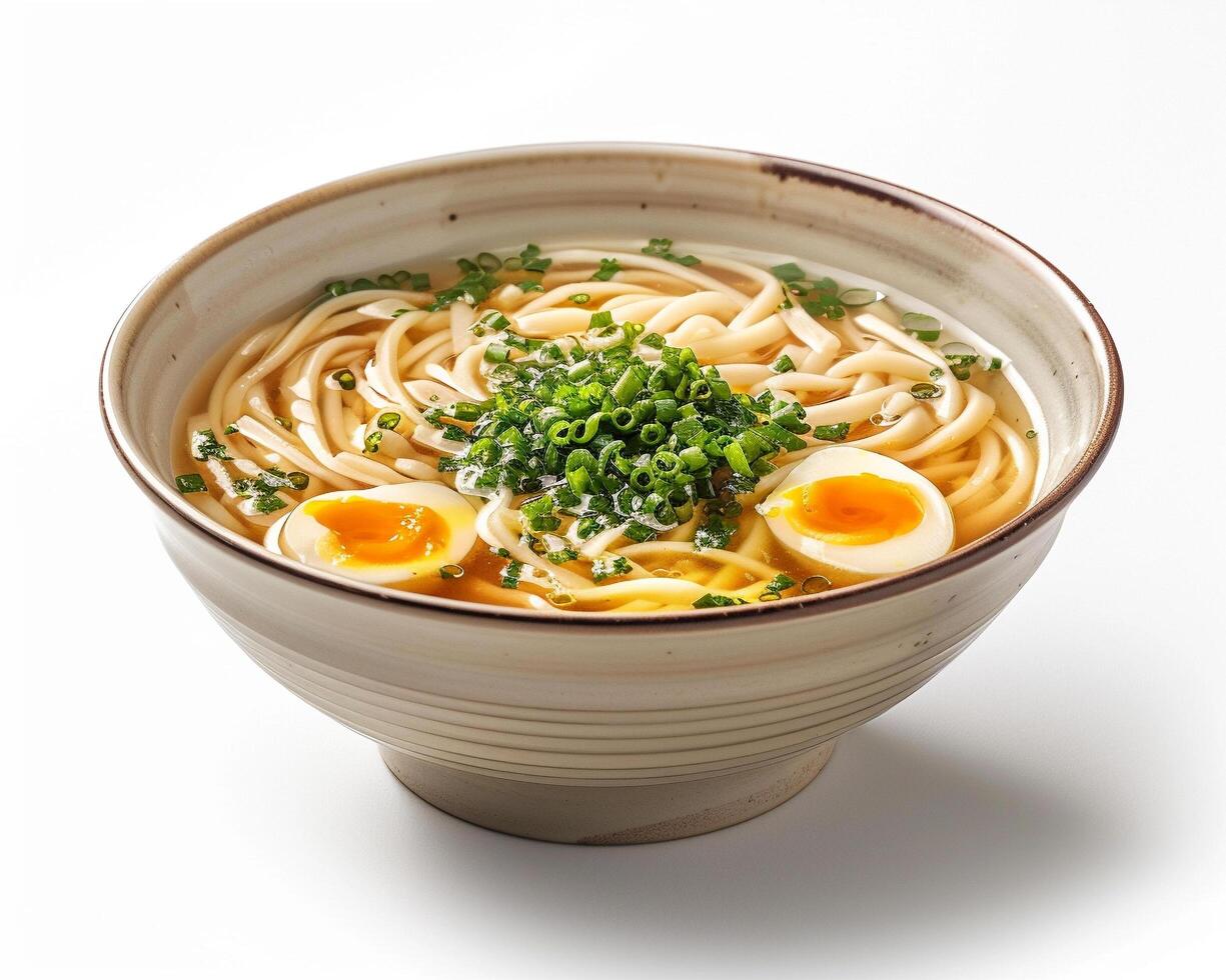 a bowl of ramen with eggs and green onions photo