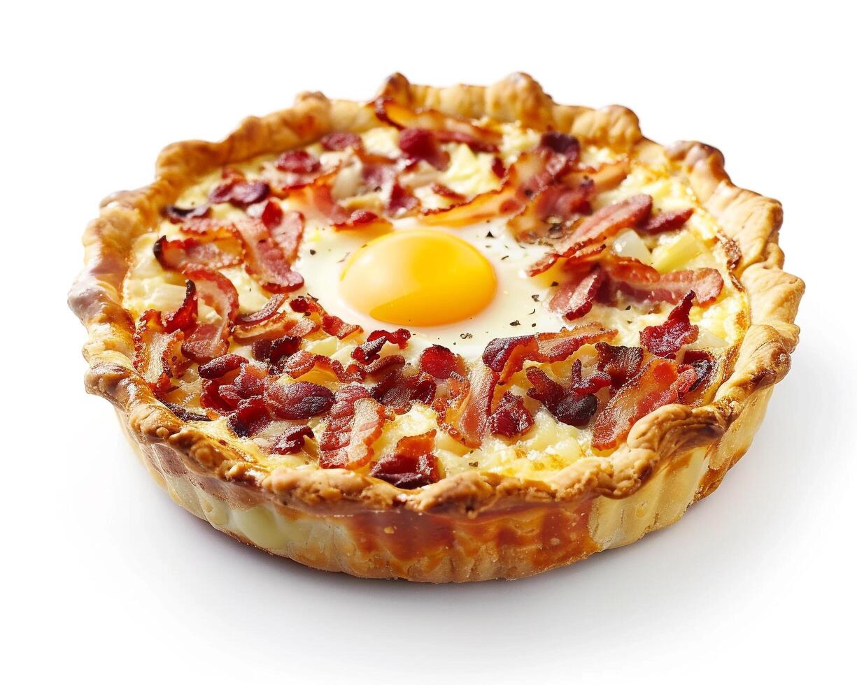 a quiche with bacon and an egg on top photo