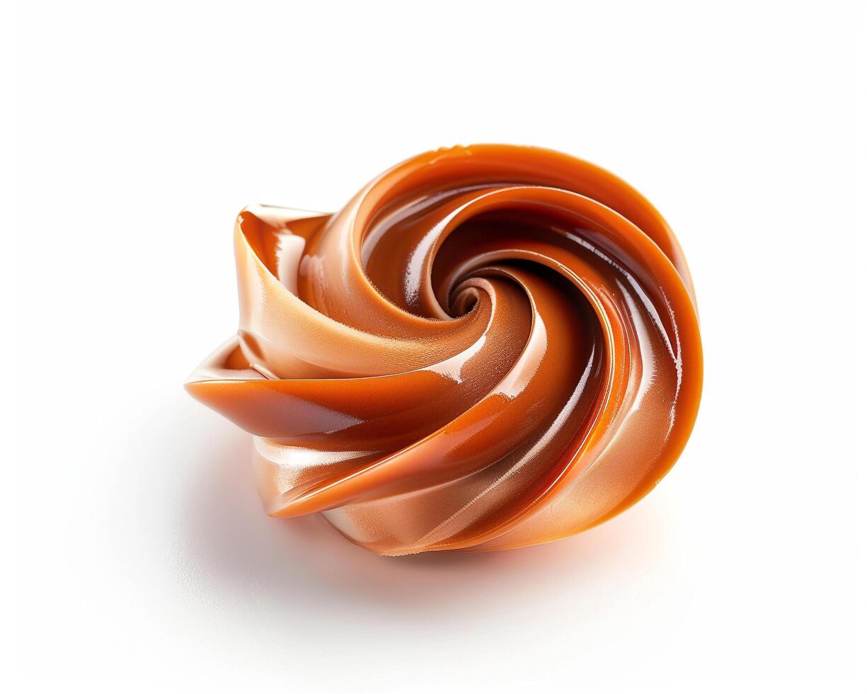 A swirl of caramel on a white background photo