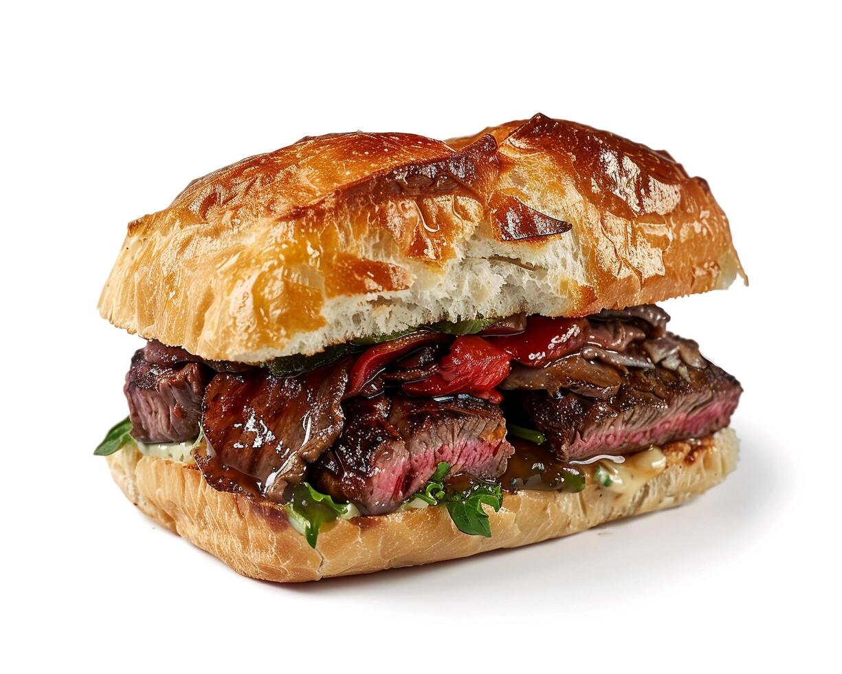 a steak sandwich with a bun and lettuce photo