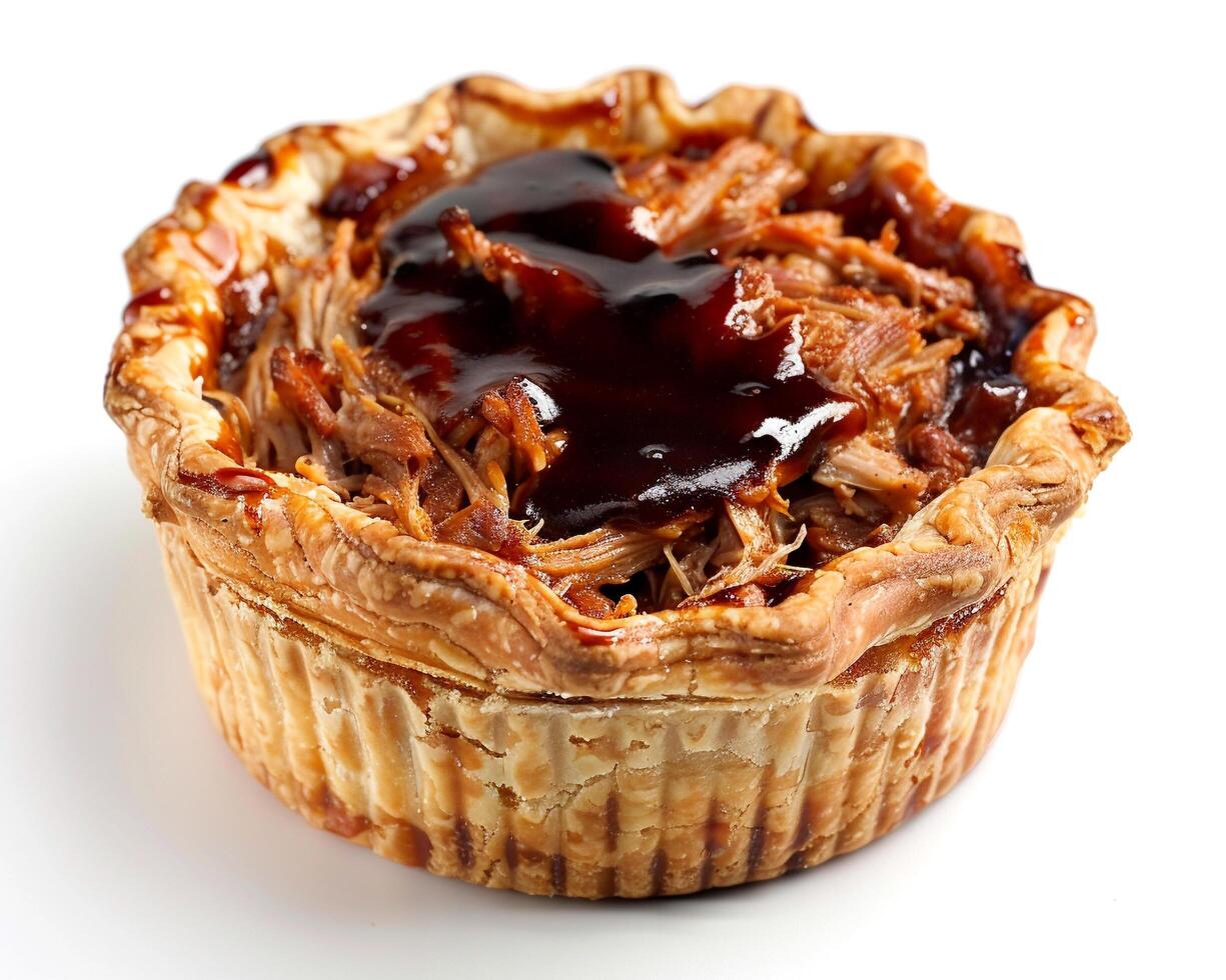 a pastry with meat and sauce on top photo