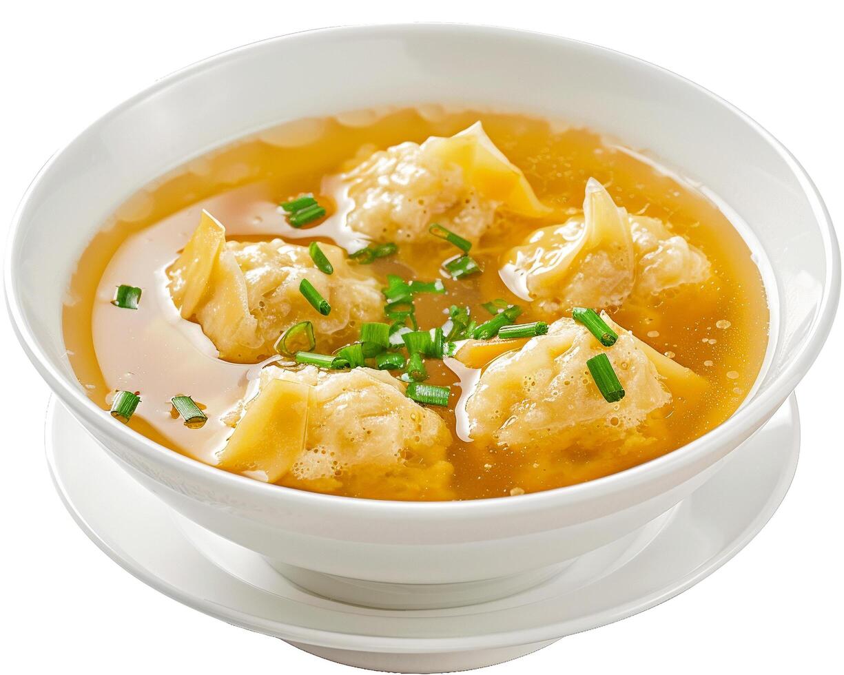 bowl of soup with dumplings in it photo