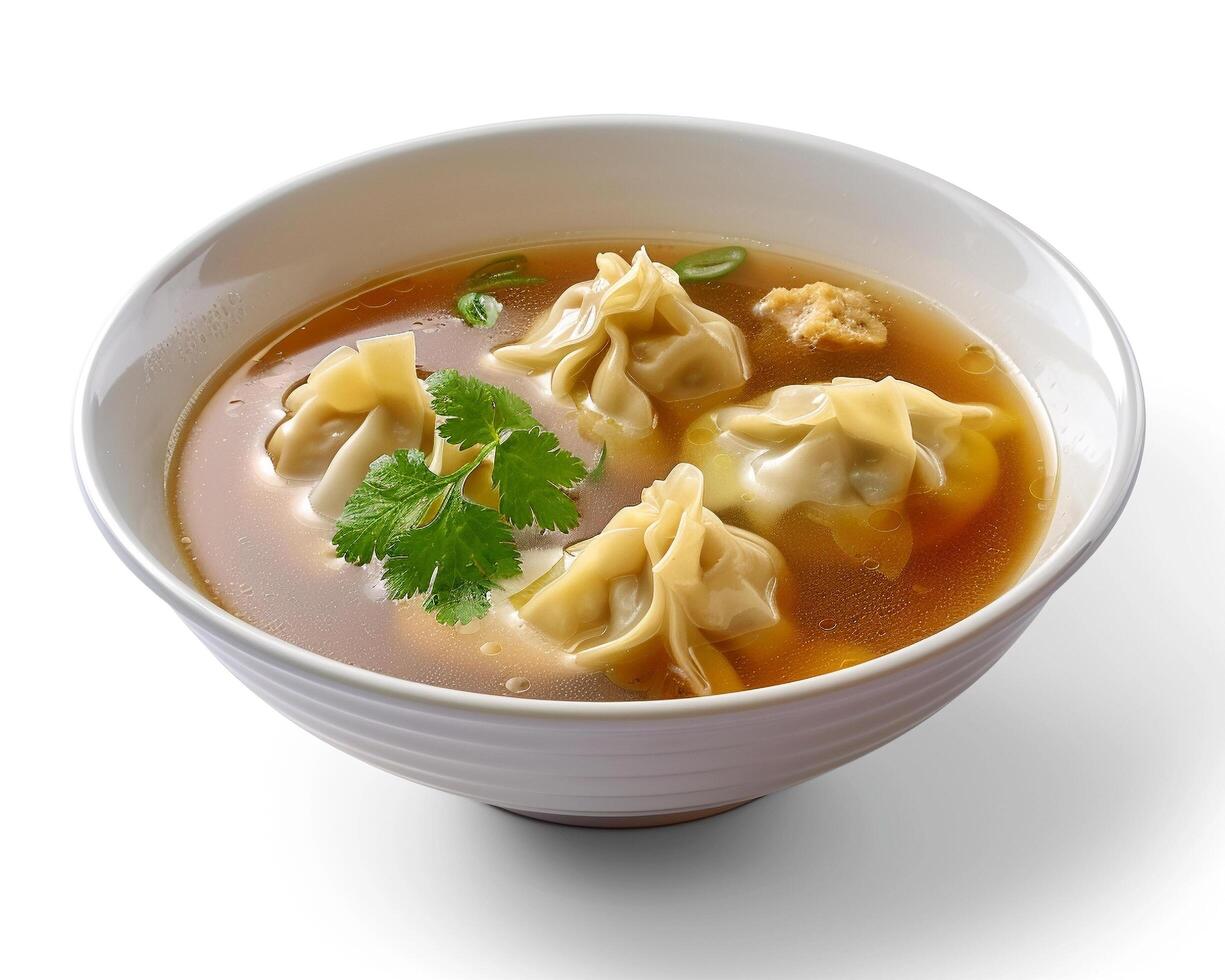 bowl of soup with dumplings in it photo