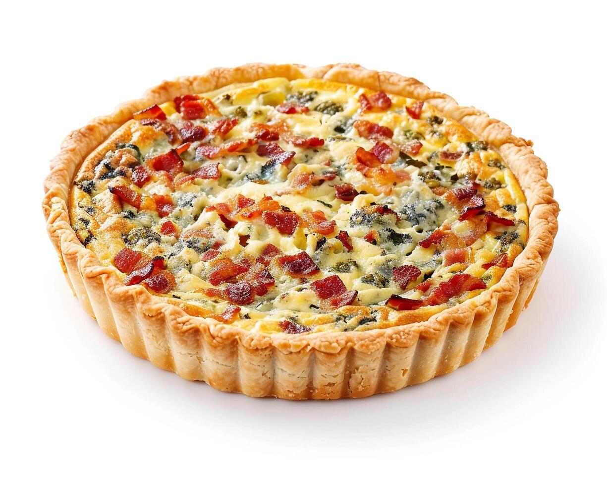 a quiche with bacon and spinach on a white background photo