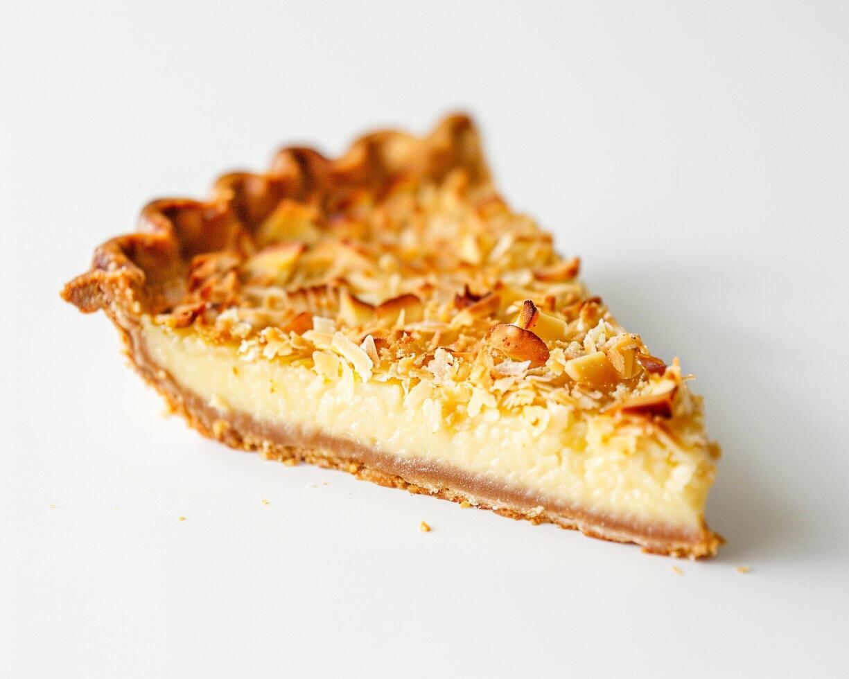 a slice of pie on a white surface photo