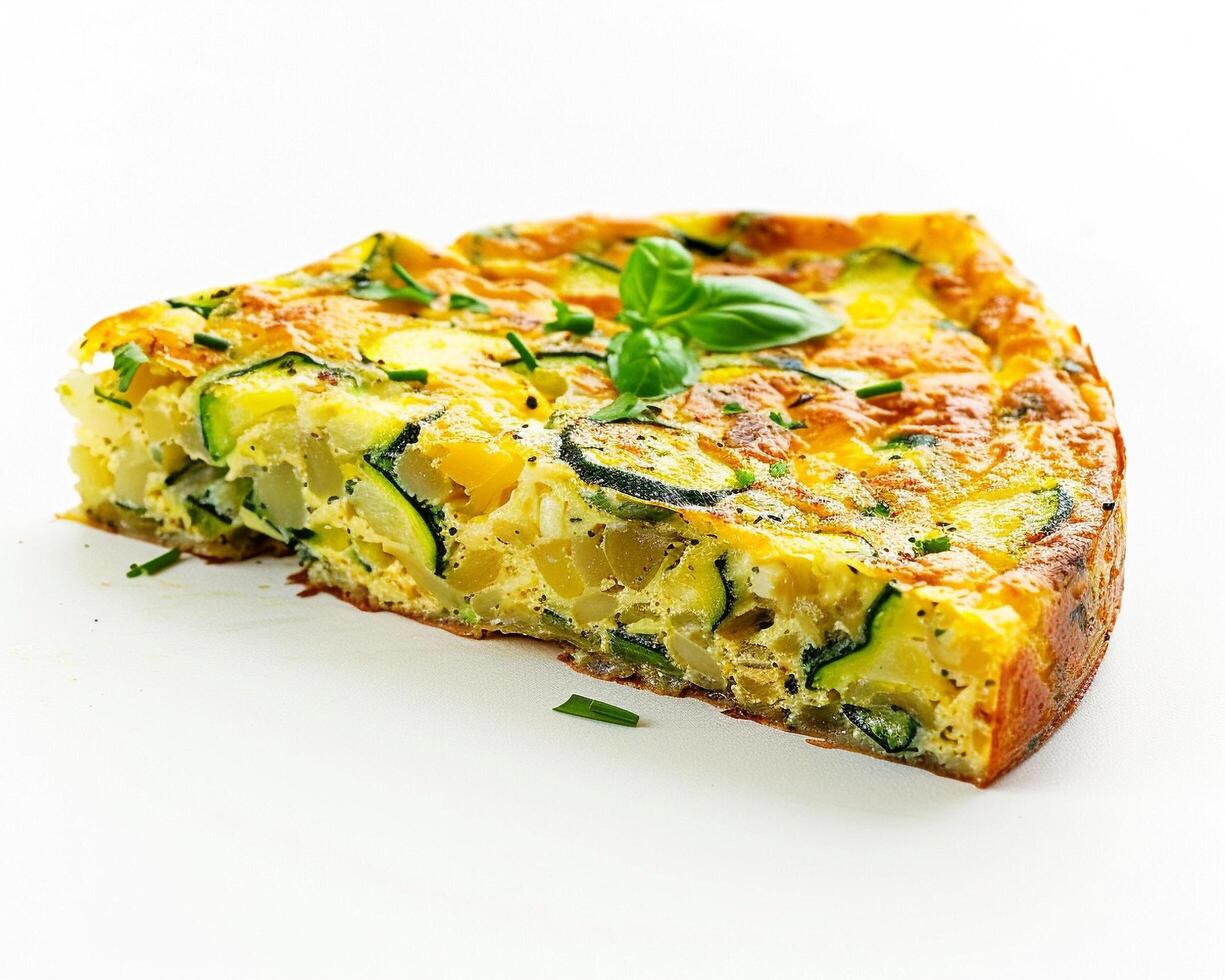 a slice of quiche on a white surface photo