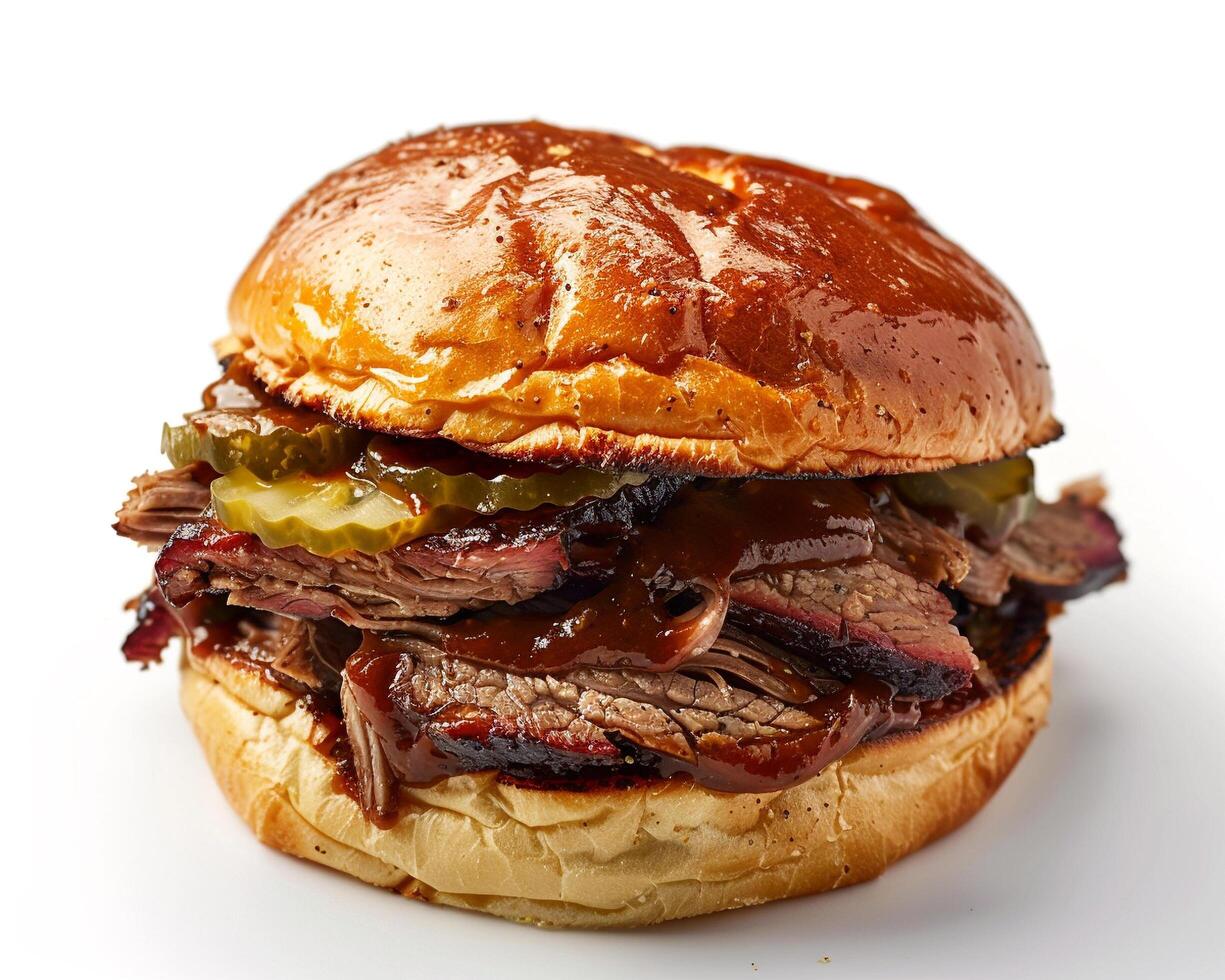 a bbq sandwich with pickles and barbecue sauce photo