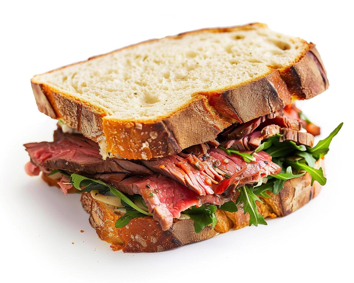 a sandwich with meat and greens on a white background photo