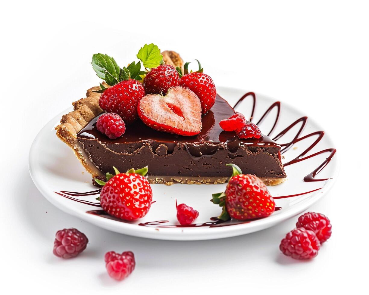 a piece of chocolate pie with strawberries and raspberries photo