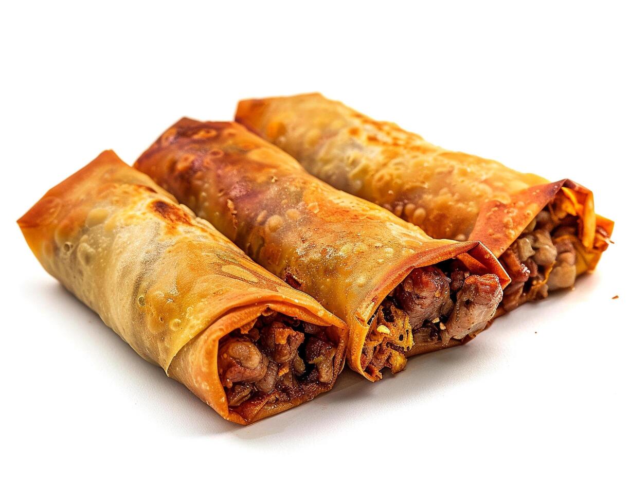 three meat and cheese filled rolls on a white background photo